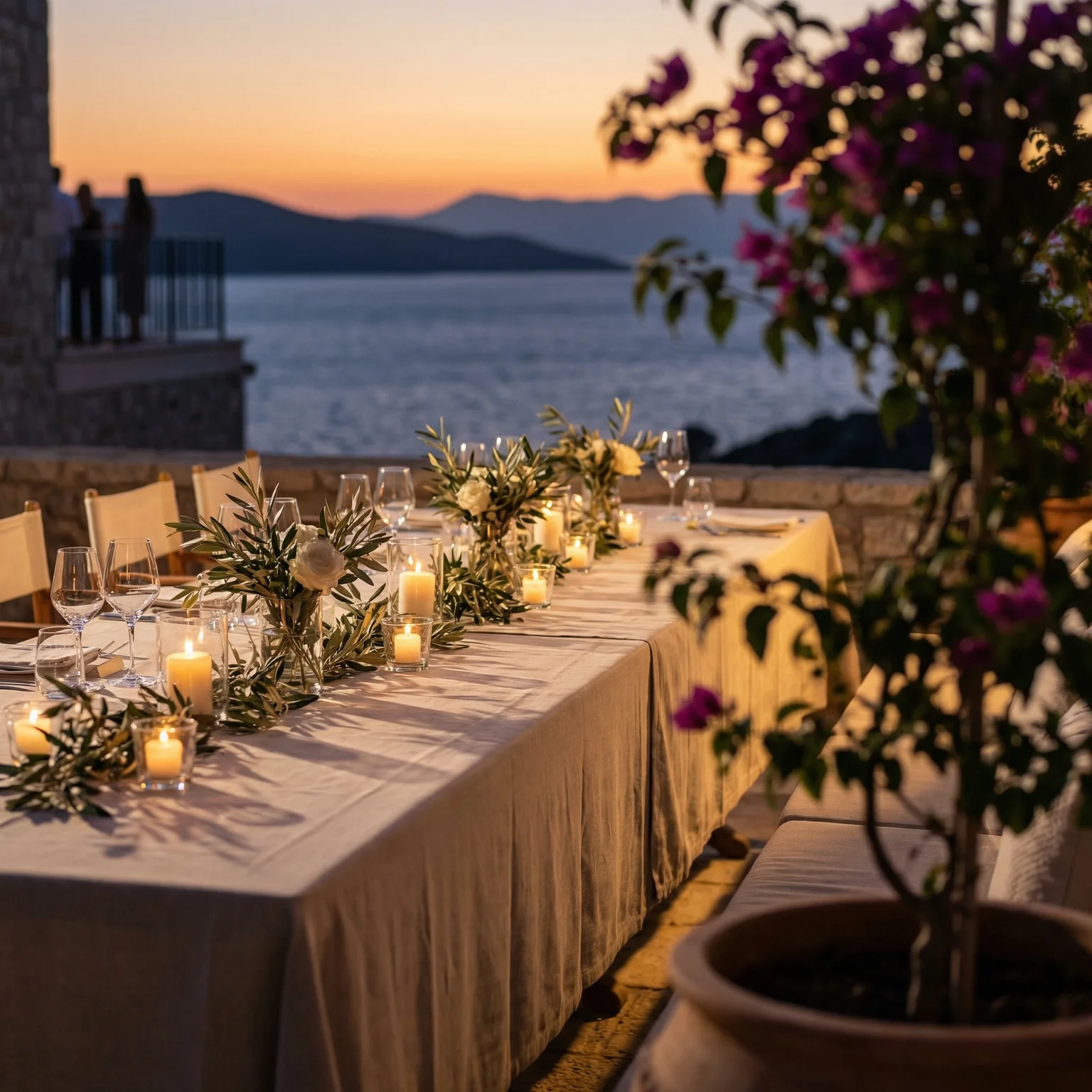 Luxury event dining setup at sunset showcasing high-end hospitality website design